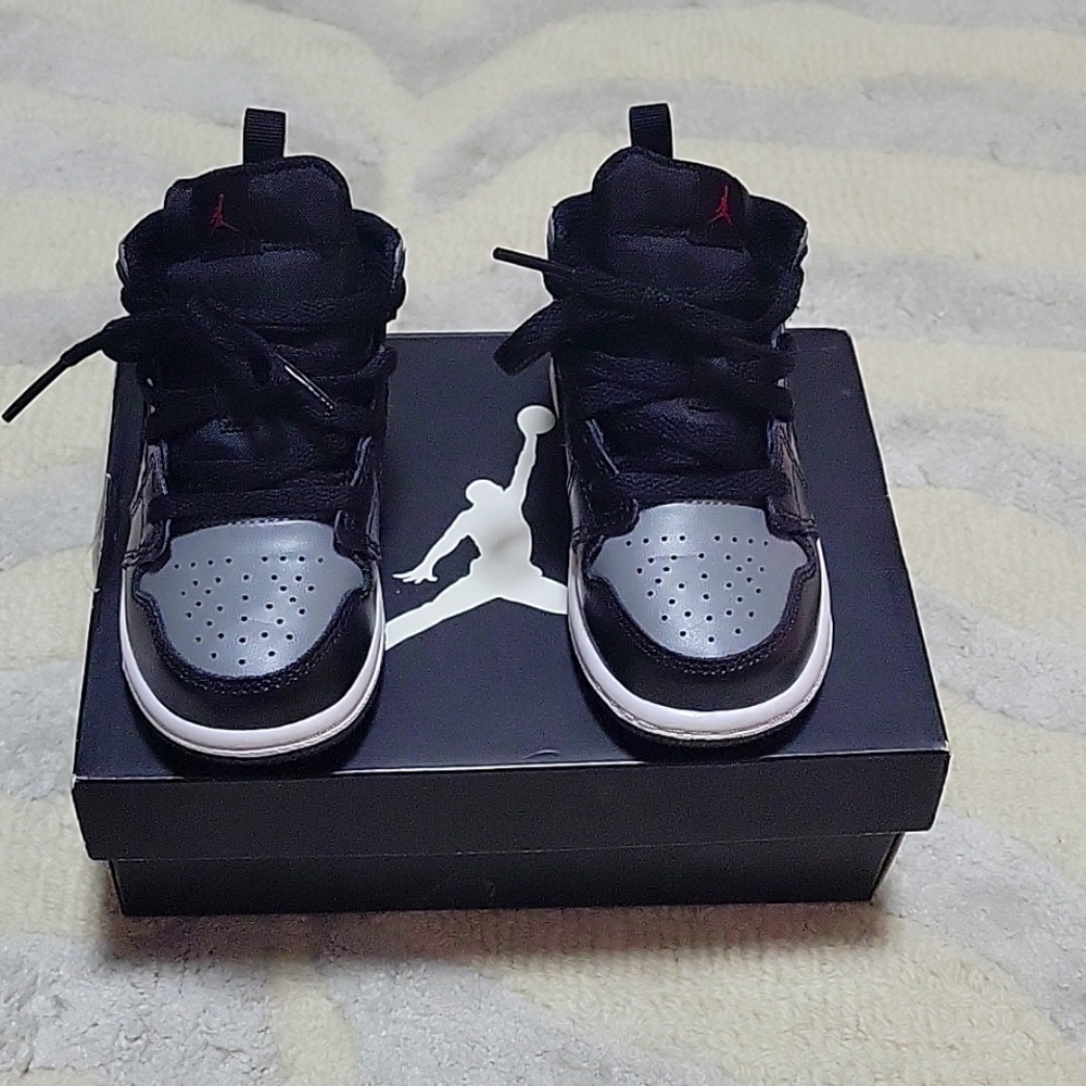 Black, grey and red Jordan 7C sneakers